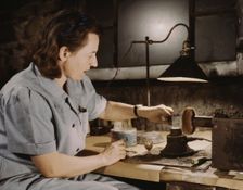 Formerly a sculptress and designer of tiles, Dorothy Cole converted..., Glenview, Ill., 1942. Creator: Howard Hollem