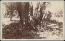 F.A. Williams resting against a tree, 1892. Creator: Unknown