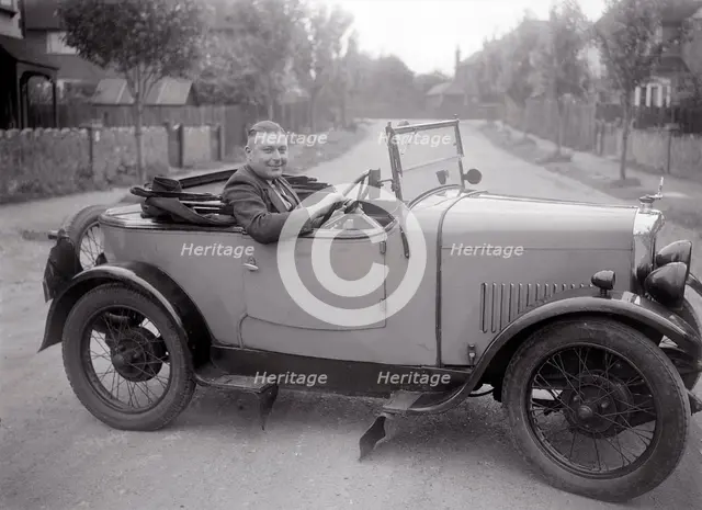 FA Thatcher behind the wheel of a 1929 Triumph Super Seven open four-seater. Artist: Bill Brunell.