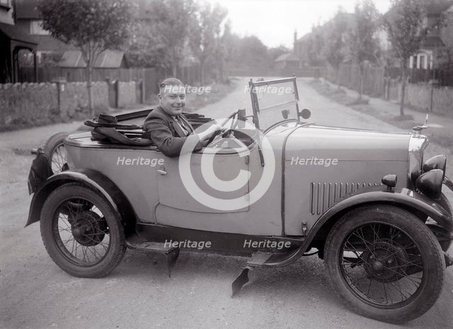FA Thatcher behind the wheel of a 1929 Triumph Super Seven open four-seater. Artist: Bill Brunell.