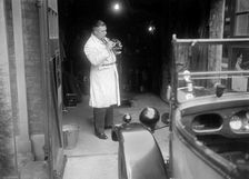 FA Thatcher working on his 1929 Triumph Super Seven. Artist: Bill Brunell