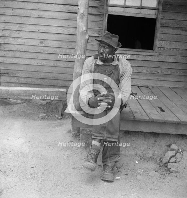 Father of sharecropper family, Person County, North Carolina, 1939. Creator: Dorothea Lange.