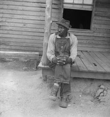 Father of sharecropper family, Person County, North Carolina, 1939. Creator: Dorothea Lange