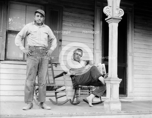 Father and son, idle American workman, near Bridgton, New Jersey, 1936. Creator: Dorothea Lange.