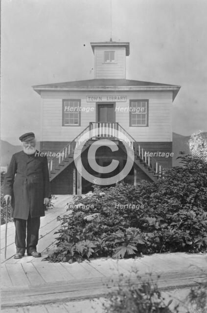 Father William Duncan, a missionary, in front of town library, between c1900 and 1923. Creator: Unknown.