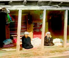 Fabric merchants in the Registan, Samarkand, between 1905 and 1915. Creator: Sergey Mikhaylovich Prokudin-Gorsky