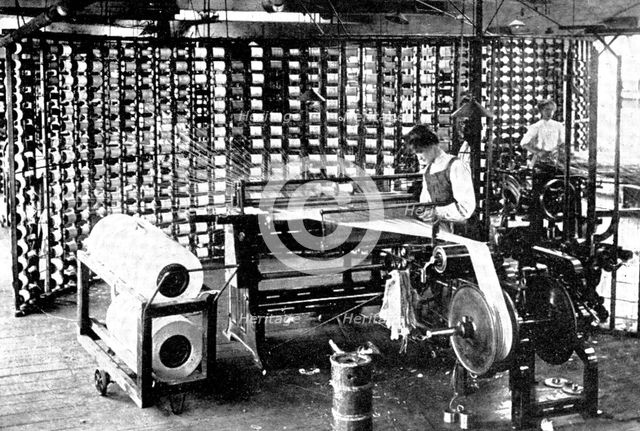 Fabric in the making: warping, 1909. Creator: Unknown.
