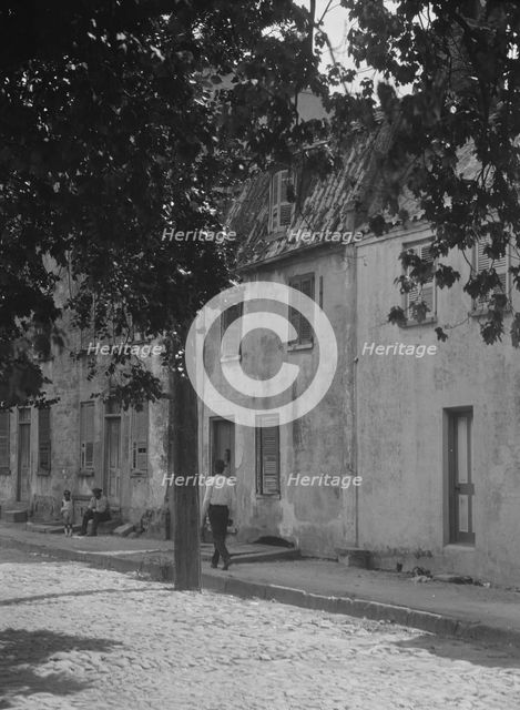 Facades of two-story houses, [17 Chalmers Street], Charleston, South Carolina, between 1920 and 1926 Creator: Arnold Genthe.