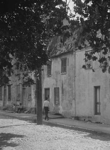 Facades of two-story houses, [17 Chalmers Street], Charleston, South Carolina, between 1920 and 1926 Creator: Arnold Genthe