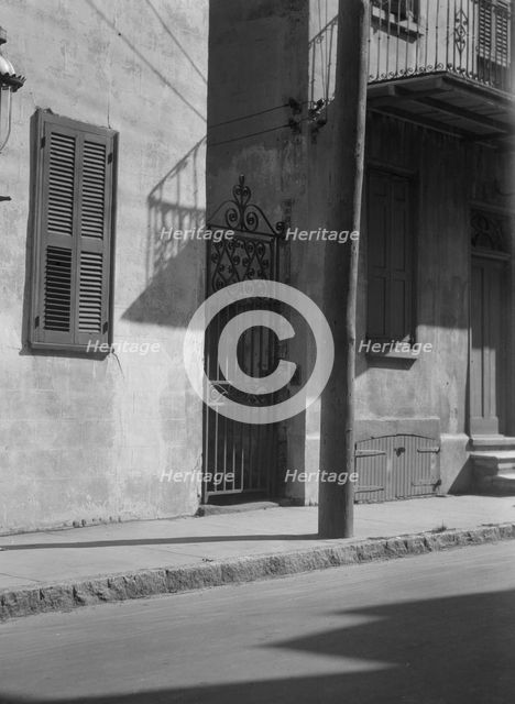 Facades of multi-story houses, New Orleans or Charleston, South Carolina, between 1920 and 1926. Creator: Arnold Genthe.