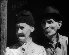 Faces of an Elderly Couple As They Watch a Train Arriving at a Station, 1932. Creator: British Pathe Ltd