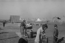 Facilities for washing in the camp for white flood...at Forrest City, Arkansas, 1937. Creator: Walker Evans