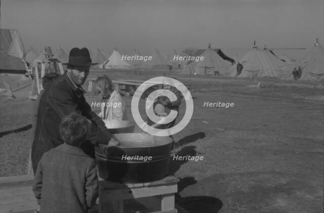 Facilities for washing in the camp for white flood refugees at Forrest City, Arkansas, 1937. Creator: Walker Evans.