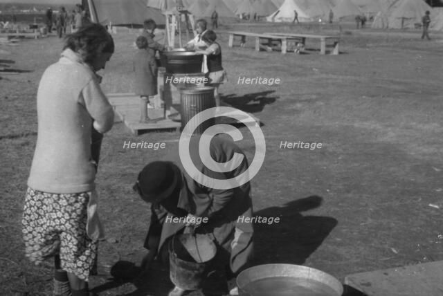 Facilities for washing in the camp for white flood refugees, Forrest City, Arkansas, 1937. Creator: Walker Evans.