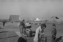 Facilities for washing in the camp for white flood...at Forrest City, Arkansas, 1937. Creator: Walker Evans