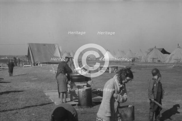 Facilities for washing in the camp for white flood...at Forrest City, Arkansas, 1937. Creator: Walker Evans.