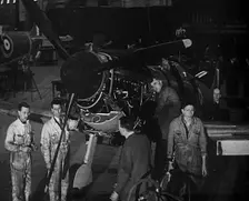 Factory Workers Inspecting a Spitfire Under Construction, 1940. Creator: British Pathe Ltd