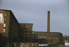 Factory buildings in Lowell, Mass., 1940 or 1941. Creator: Jack Delano