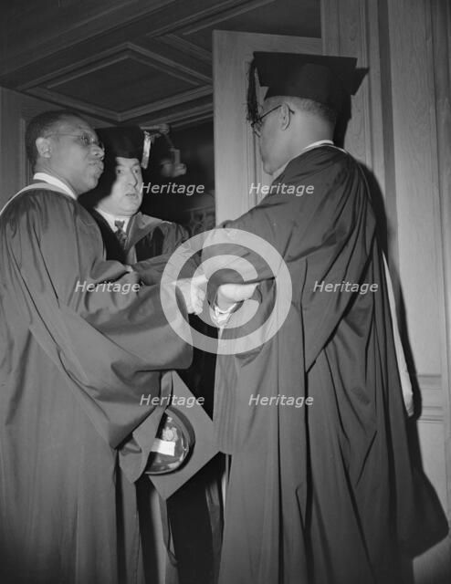 Faculty members of the Howard University during commencement, Washington, D.C, 1942. Creator: Gordon Parks.