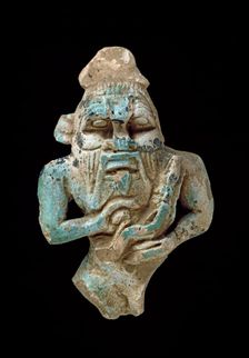 Faience amulet of Bes nursing a Horus, XXVth Dynasty (c770 BC-c715 BC)