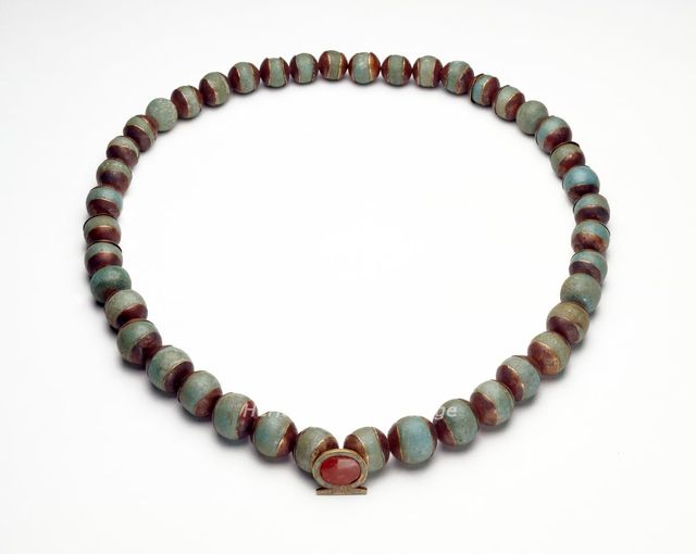 Faience cylinder and necklace, Middle Kingdom (c1975 BC-c1640 BC). Artist: Unknown.
