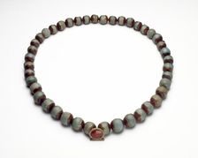 Faience cylinder and necklace, Middle Kingdom (c1975 BC-c1640 BC)