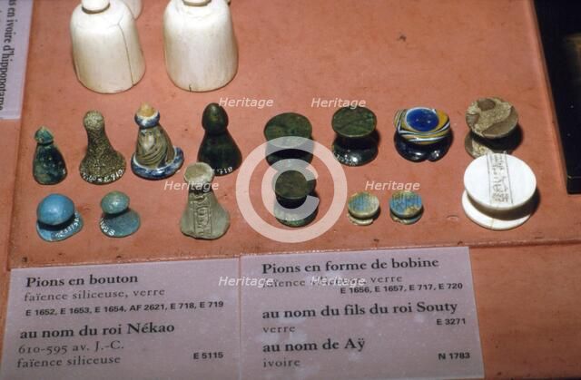 Faience, Glass and Ivory Playing Pieces from Egyptian Tombs, circa 1500 BC. Artist: Unknown.
