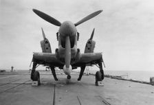 Fairey Firefly aircraft ready to be transported to the hangar lift, HMS Venerable 1945