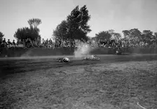 Fallen rider in a speedway race at Lea Bridge Stadium, Leyton, London, 1928. Artist: Bill Brunell