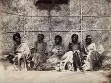 Famine in Mysore, India: six emaciated women, five sitting and one leaning on another's lap, 1876-78 Creator: Willoughby Wallace Hooper