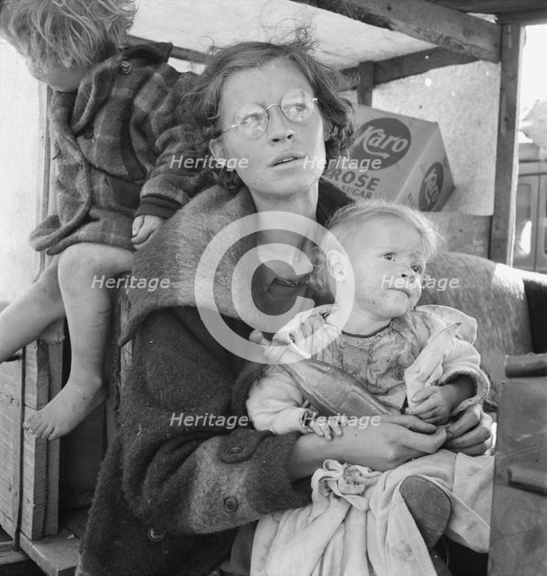 Family, one month from South Dakota, now on the road..., Tulelake, Siskiyou County, California, 1939 Creator: Dorothea Lange.