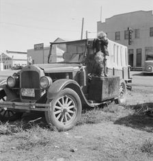Family, one month from South Dakota, now on the road..., Tulelake, Siskiyou County, California, 1939 Creator: Dorothea Lange