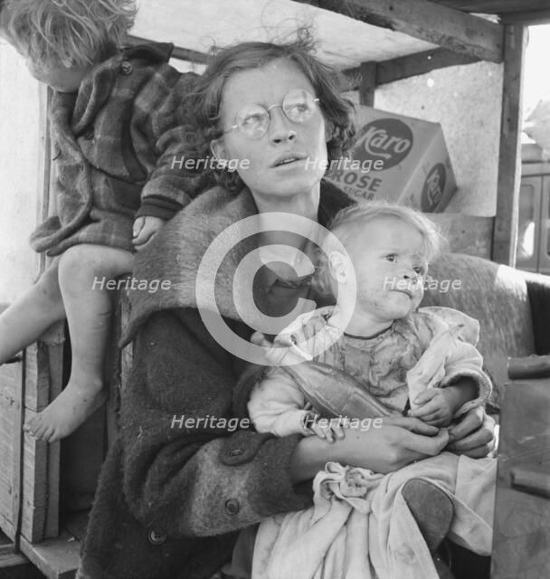 Family, one month from South Dakota, now on the road..., Tulelake, Siskiyou County, California, 1939 Creator: Dorothea Lange.