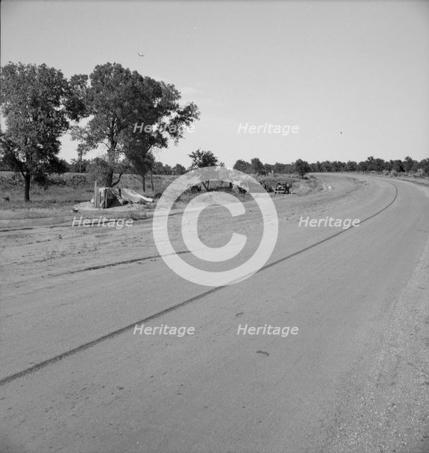 Family camped on U.S. Highway 63, Cache County, Oklahoma, 1937. Creator: Dorothea Lange.