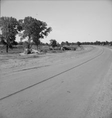 Family camped on U.S. Highway 63, Cache County, Oklahoma, 1937. Creator: Dorothea Lange