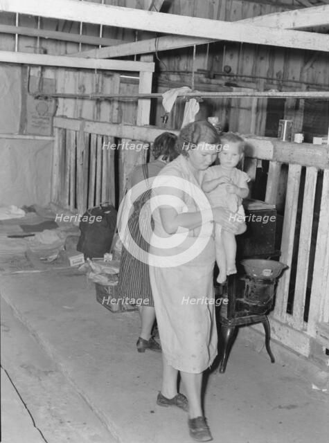 Family from Oklahoma, during cotton strike, near Shafter, California, 1939. Creator: Dorothea Lange.