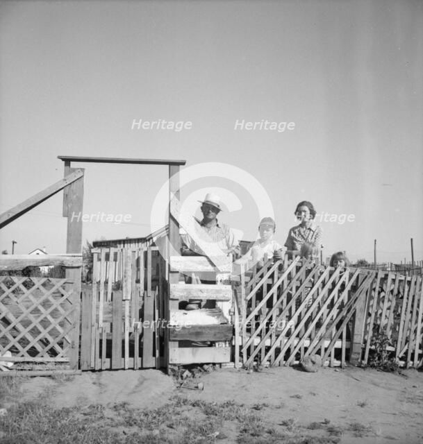 Family from Oklahoma, Highway City, near Fresno, California, 1939. Creator: Dorothea Lange.