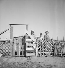 Family from Oklahoma, Highway City, near Fresno, California, 1939. Creator: Dorothea Lange