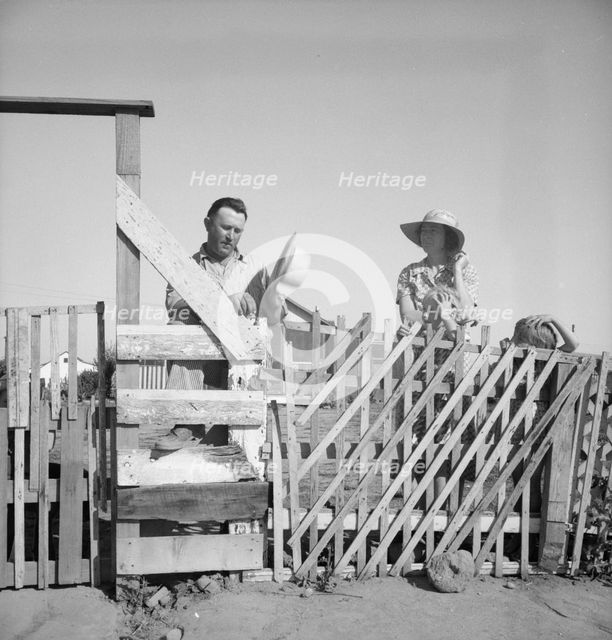 Family from Oklahoma, Highway City, near Fresno, California, 1939. Creator: Dorothea Lange.