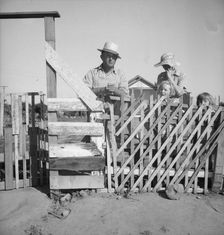 Family from Oklahoma, Highway City, near Fresno, California, 1939. Creator: Dorothea Lange