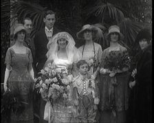 Family Gathering for Photographs at the Wedding of Beatrice Lillie and Sir Robert Peel..., 1920. Creator: British Pathe Ltd