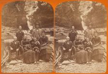 Family group portrait, posed in natural setting on rocks, 1868-1878. Creator: James Douglas Hope
