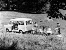 Family group with a 1968 Ford Explorer Camper van, (1968?)