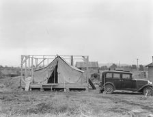 Family living in tent while building..., near Klamath Falls, Klamath county, Oregon, 1939. Creator: Dorothea Lange