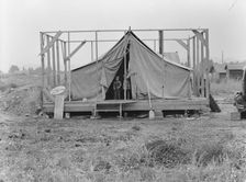 Family living in tent while building the house..., near Klamath Falls, Klamath County, Oregon, 1939. Creator: Dorothea Lange