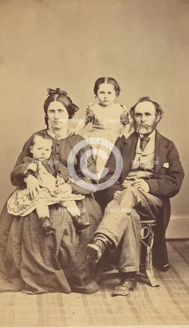 Family portrait: mother, father and two children, 1870s. Creator: BF Green.