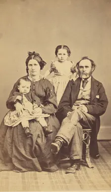 Family portrait: mother, father and two children, 1870s. Creator: BF Green