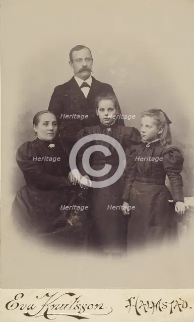 Family portrait: mother, father, and two daughters, 1895-1912. Creator: Eva Knutsson.