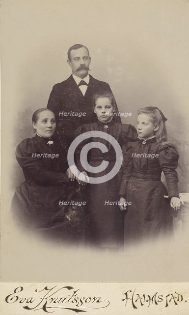 Family portrait: mother, father, and two daughters, 1895-1912. Creator: Eva Knutsson.