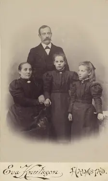 Family portrait: mother, father, and two daughters, 1895-1912. Creator: Eva Knutsson